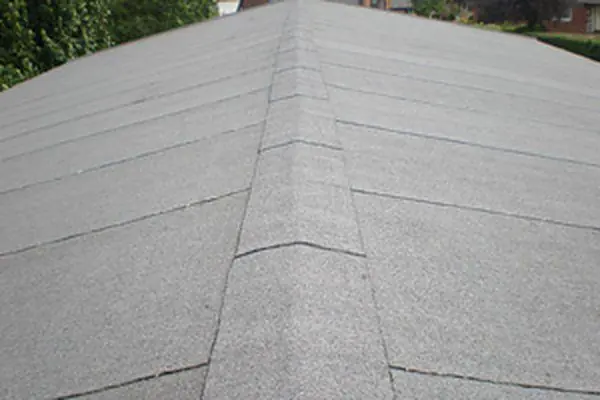Mineral felt roof with a capped ridge